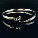 Elegant Silver Bracelet with Gold Accent