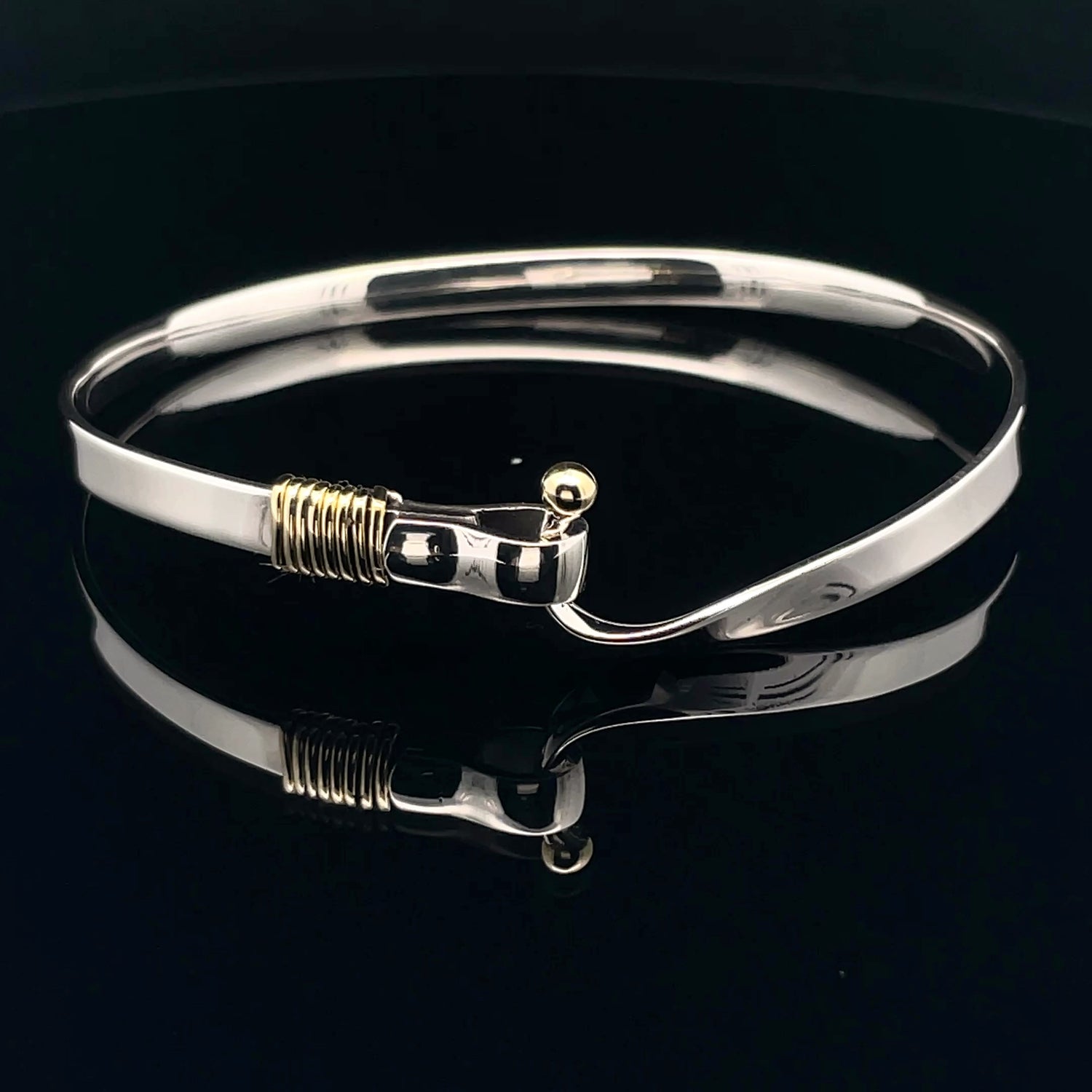 Elegant Silver Bracelet with Gold Accent