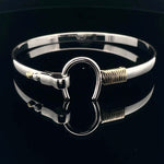 Elegant Silver Bracelet with Gold Accent