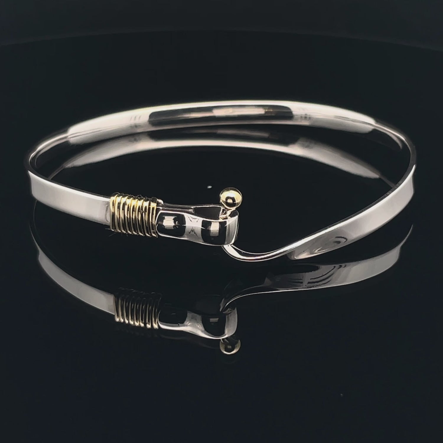 Elegant Silver Bracelet with Gold Accent
